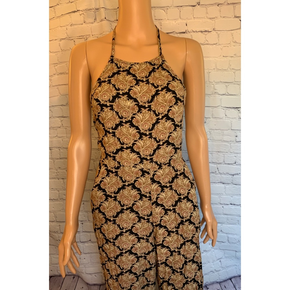 GORGEOUS Long Romper with BowTie Backside macy’s size small